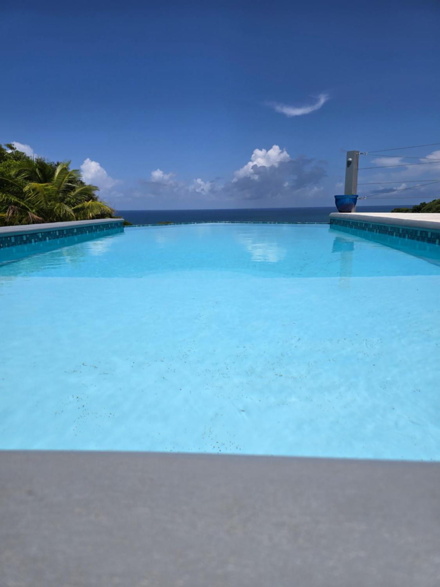 Hodges Bay House Apartment Calibishie Екстериор снимка